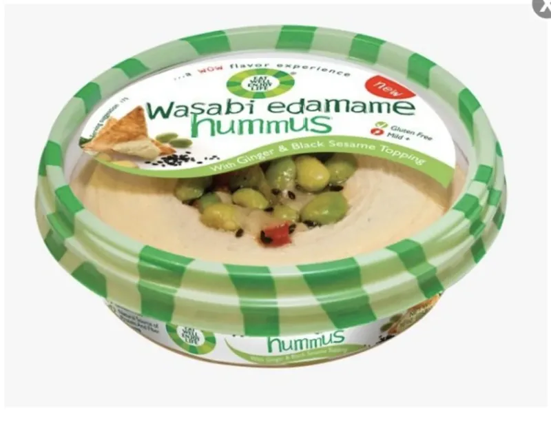 Wasabi Edamame hummus with ginger and black sesame in sealed retail cup